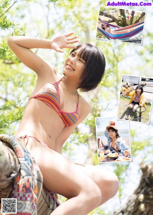 A woman in a bikini and a hat posing for a magazine.